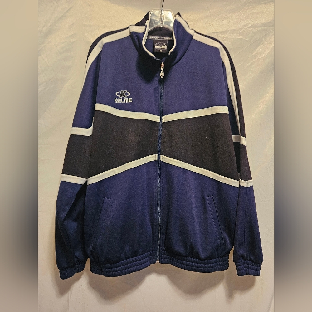 Kelme Futbol Soccer Jacket Men's Size XL Blue With Black And White Detailing.